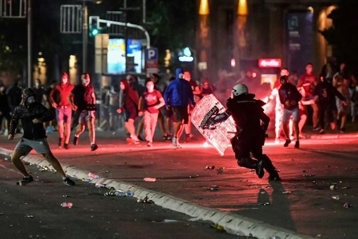 Some demonstrators also threw firecrackers and chanted nationalist slogans, according to AFP journalists