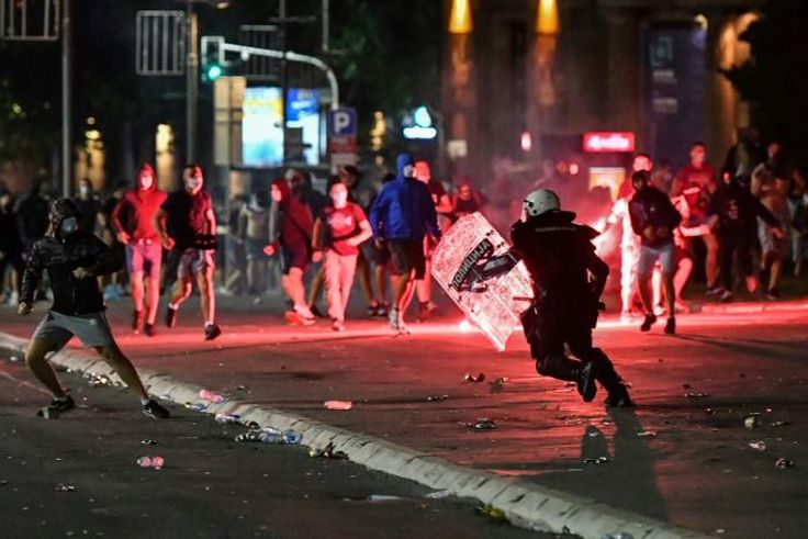 Some demonstrators also threw firecrackers and chanted nationalist slogans, according to AFP journalists