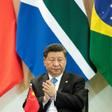 China's President Xi Jinping (R) and Russia's President Vladimir Putin, pictured November 2019, spoke after the US criticised China for not sharing information on the virus more quickly
