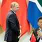 China's President Xi Jinping (R) and Russia's President Vladimir Putin, pictured November 2019, spoke after the US criticised China for not sharing information on the virus more quickly