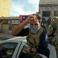 Fighters loyal to Libyan's UN-recognised Government of National Accord celebrate after the capture of the coastal city of Sabratha from forces of military strongman Khalifa Haftar