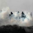 Young Palestinians brave Israeli tear gas to demonstrate against a rumoured land seizure near the northern West Bank city of Nablus