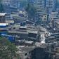 Social distancing is near impossible for the roughly one million people in the Dharavi slum in Mumbai