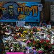 A woman burns sage and offers prayers as she pays her respects at a makeshift memorial in honor of George Floyd, on June 3, 2020 in Minneapolis, Minnesota