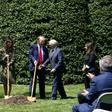 US President Donald Trump and Vice President Mike Pence, accompanied by their wives, plant a tree at the White House to mark Earth Day despite their frequent criticism of environmentalists