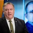Secretary of State Mike Pompeo stands before an image of former US marine Paul Whelan as he urges his release during a news conference on June 10, 2020