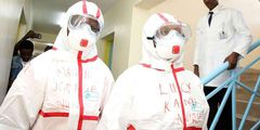 File image of medics wearing protective gear at Mbagathi Hospital in Nairobi where an isolation and treatment centre for the new coronavirus was set up on March 6