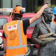 A crane hoists the sculpture of Captain John Fane Charles Hamilton from the city square after requests from Maori and threats from anti-racism protesters to topple it