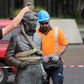 A crane hoists the sculpture of Captain John Fane Charles Hamilton from the city square after requests from Maori and threats from anti-racism protesters to topple it