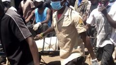 Residents march to Muthaiga Police Station with corpse of a man murdered in Ruaraka on Sunday at 7:30 pm, protests over police refusing to pick the body