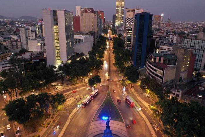 Light traffic travels on Mexico City's Reforma Avenue on March 23
