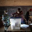 An electoral officials wore masks for the last round of voting