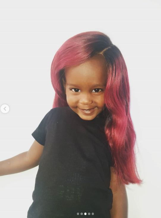 Njugush and Wakavinye's son in a wig (Instagram)