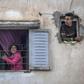 Moroccans confined at home thank the authorities from their windows as security forces and health workers instruct people to return to and remain at home as a measure against the COVID-19 coronavirus pandemic, in Rabat's district of Takadoum