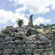 A carved bird in standstone temporarily left an on-site museum to take up its rightful place in the Great Zimbabwe ruins, symbol of an African culture
