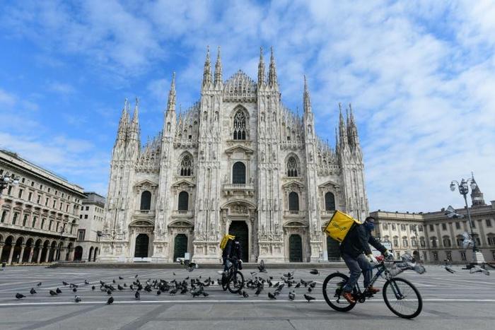 Italy's epicentre of the global outbreak admitted it was experiencing a "constant and progressive increase of the deceased awaiting cremation;" pictured is file image of Milan from March 31, 2020