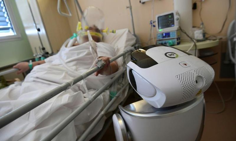 One of the six robots at the Circolo di Varese hospital in northern Italy checks up on a patient in the intensive care unit, helping medical staff reduce the risk of direct contact