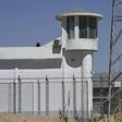 A watchtower on a high-security facility near what is believed to be a re-education camp on the outskirts of Hotan, in China's northwestern Xinjiang region, is seen in May 2019