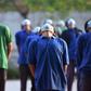 Homeless labourers staying at Yamuna stadium  in Delhi as part of India's virus lockdown do their daily exercises