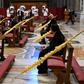 Palm fronds adorned largely empty pews as Pope Francis celebrated Palm Sunday mass in St. Peter's Basilica mass on April 5. Easter services are set to take place behind closed doors