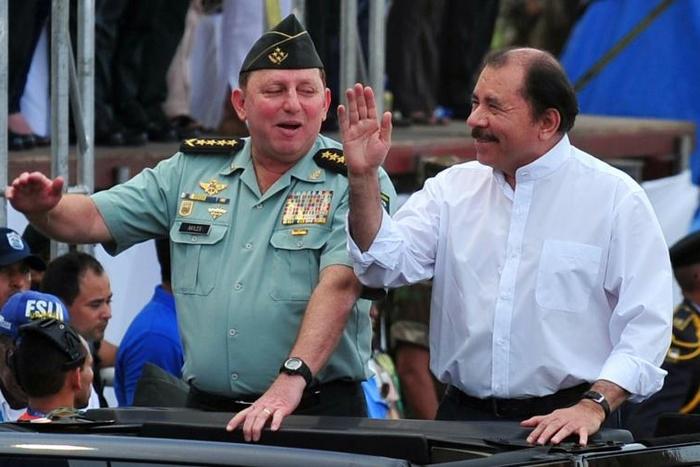 Under US sanctions: Nicaraguan President Daniel Ortega (R) and Army General Julio Cesar Aviles (L), seen in 2012