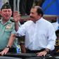 Under US sanctions: Nicaraguan President Daniel Ortega (R) and Army General Julio Cesar Aviles (L), seen in 2012