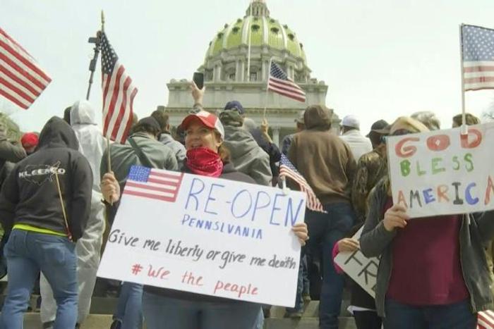 Hundreds of people, including lawmakers, gather in Pennsylvania to protest at measures urging much of the US to stay at home during the coronavirus pandemic.Duration:01:19