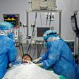 Nurses check the intubation of a COVID-19 patient in Lima, Peru, which has topped 10,000 deaths