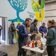 Customers queued out of the front door of the warehouse distillery and into the car park of the industrial estate outside, obeying strict "social distancing" measures