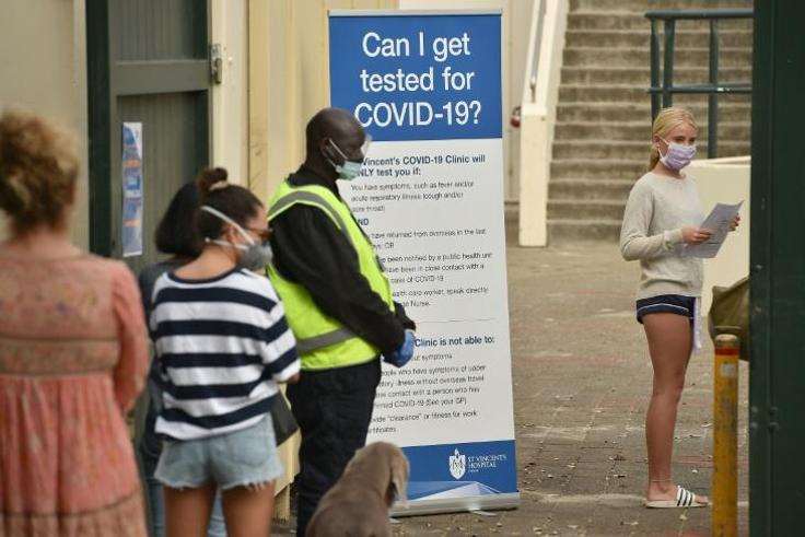 People line up for coronavirus testing at Bondi Beach in Sydney