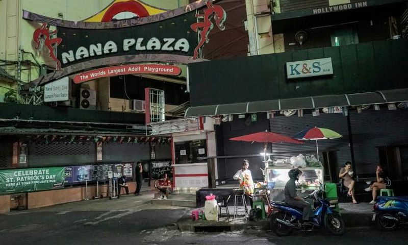 Red-light districts from Bangkok to Pattaya have gone quiet with night clubs and massage parlours closed and tourists blocked from entering the country