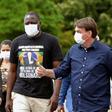Brazilian President Jair Bolsonaro (pictured May 24, 2020), who regularly rails against the mainstream media, occasionally stops outside the Alvorada Palace in Brasilia to speak to the press, but the informal event has turned tense at times