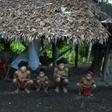 Yanomami natives in a hut  in Amazonas state, southern Venezuela, 19 km away from the border with Brazil, on September 7, 2012
