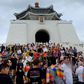 Many of those attending held placards with the names of major global cities that have been unable to celebrate Pride Month this June because of the coronavirus