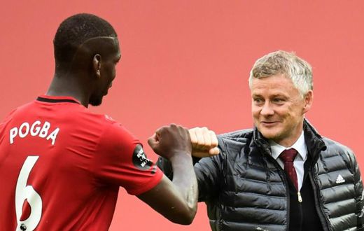 Ole Gunnar Solskjaer (right)is keen for Manchester United to extend Paul Pogba's (left) contract