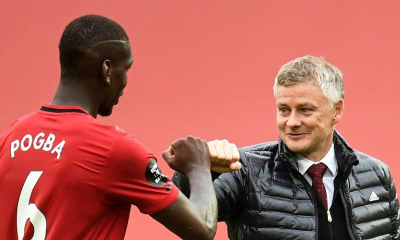 Ole Gunnar Solskjaer (right)is keen for Manchester United to extend Paul Pogba's (left) contract