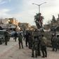 Syrian army soldiers in the town of Saraqib in the northwestern Idlib province on March 6, 2020, as government forces assumed control over the town