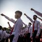 Students and youths attend a mass gathering denouncing 'defectors from the north', at the Pyongyang Youth Park Open-Air Theatre, in Pyongyang, on June 6, 2020