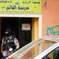A police officer walks out of Al-Irschad Mosque during a raid in Berlin, as dozens of police and special forces stormed mosques and associations linked to Hezbollah in Bremen, Berlin, Dortmund and Muenster early Thursday.