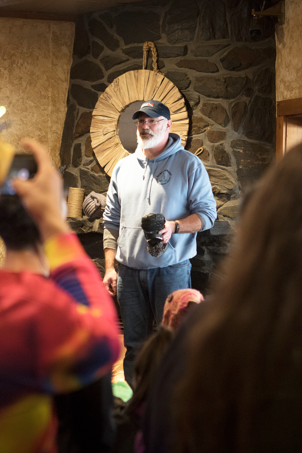 Race safety director Greg OConnor reviews the rules before swimmers hit the 31-degree water.