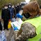 Ukrainian prisoners being handed over at the Mayorske checkpoint in eastern Ukraine