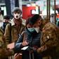 Rail passengers told AFP their identity documents were being checked on arrival to make sure they were residents of Milan