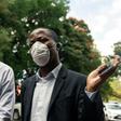 Zimbabwe Hospital Doctors Association president Tawanda Zvakada (R) and treasurer Tapiwa Mungofa speak to press at the Parirenyatwa Hospital in Harare, where they vowed to boycott work unless the government provides protective gear for  COVID-19