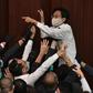 Hong Kong's legislature has been paralysed for seven months as pro-democracy politicians attempt to scupper a controversial law that bans insulting China's national anthem