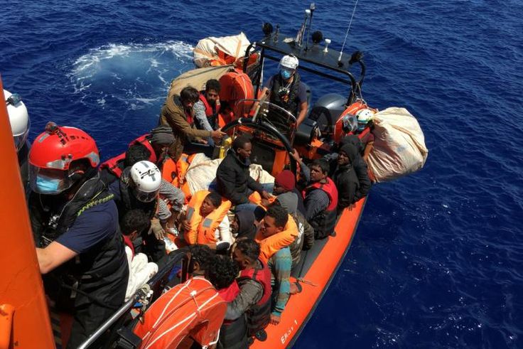 Some of the 51 migrants rescued in the first of the Ocean Viking's two operations in the Mediterrean on Thursday