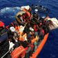 Some of the 51 migrants rescued in the first of the Ocean Viking's two operations in the Mediterrean on Thursday