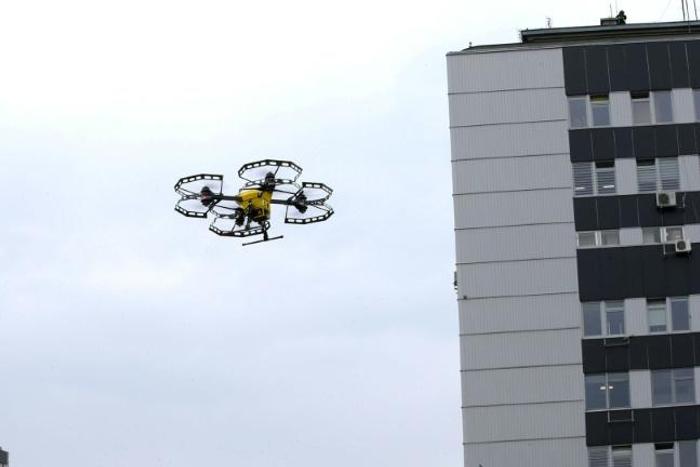 A P-art Studio picture shows a Hermes V8MT medical drone made by Spartaqs transporting coronavirus tests between two Warsaw hospitals