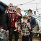 A migrant family wearing handmade protective face masks in the camp of Moria on the Greek island of Lesbos