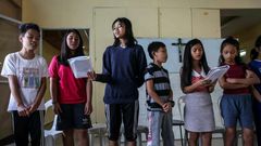 The goal is to keep the children in school and on the path toward a career, and away from the local traps of trash picking and small-time drug dealing that ensnared their fathers