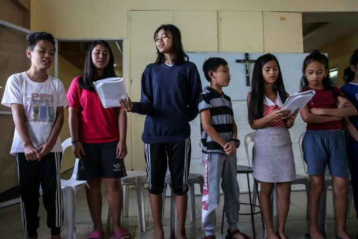 The goal is to keep the children in school and on the path toward a career, and away from the local traps of trash picking and small-time drug dealing that ensnared their fathers